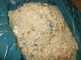 Shredded and sterilized medical waste ready to be disposed as communal waste